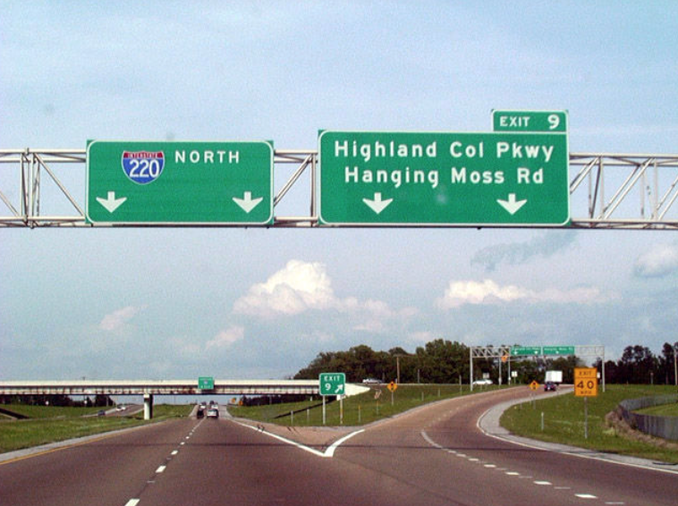 Road signs along Interstate 220 