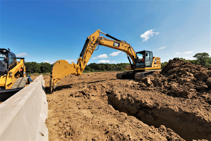 Caterpillar Equipment Digging Trenches