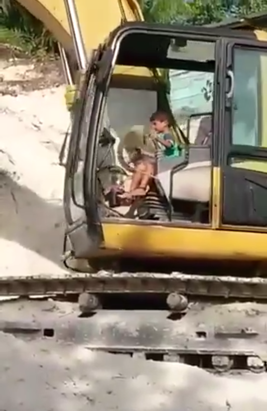 kid showing off excavator skills