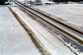 Snow fences along road in Minnesota