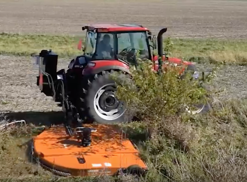 Woods' new Ditch Bank Rotary Cutters attached to tractor