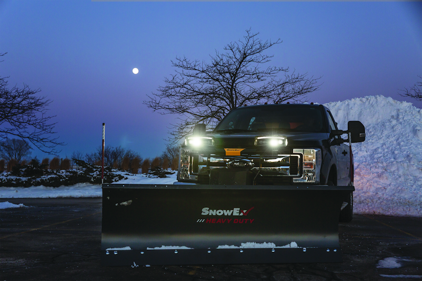 Truck with SnowEx plow and headlights