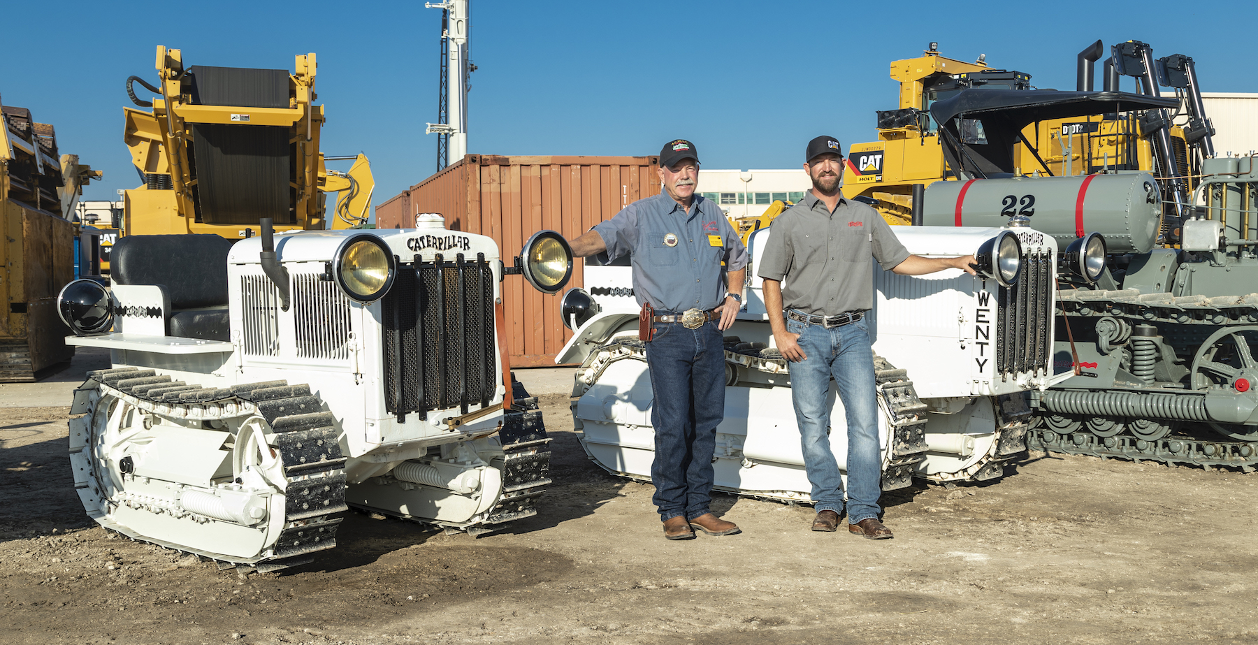 Doug and Matt Veerkamp with restored Caterpillar tractors