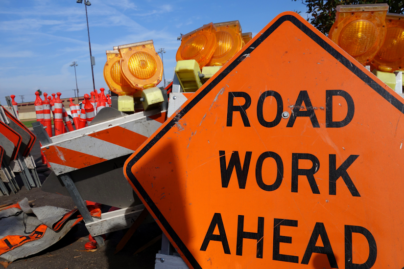 Road Work Ahead and other highway construction signs